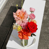 Gia Studio - Daily Vase with reflexed roses, tulips, and seasonal blooms in bubble vase. 